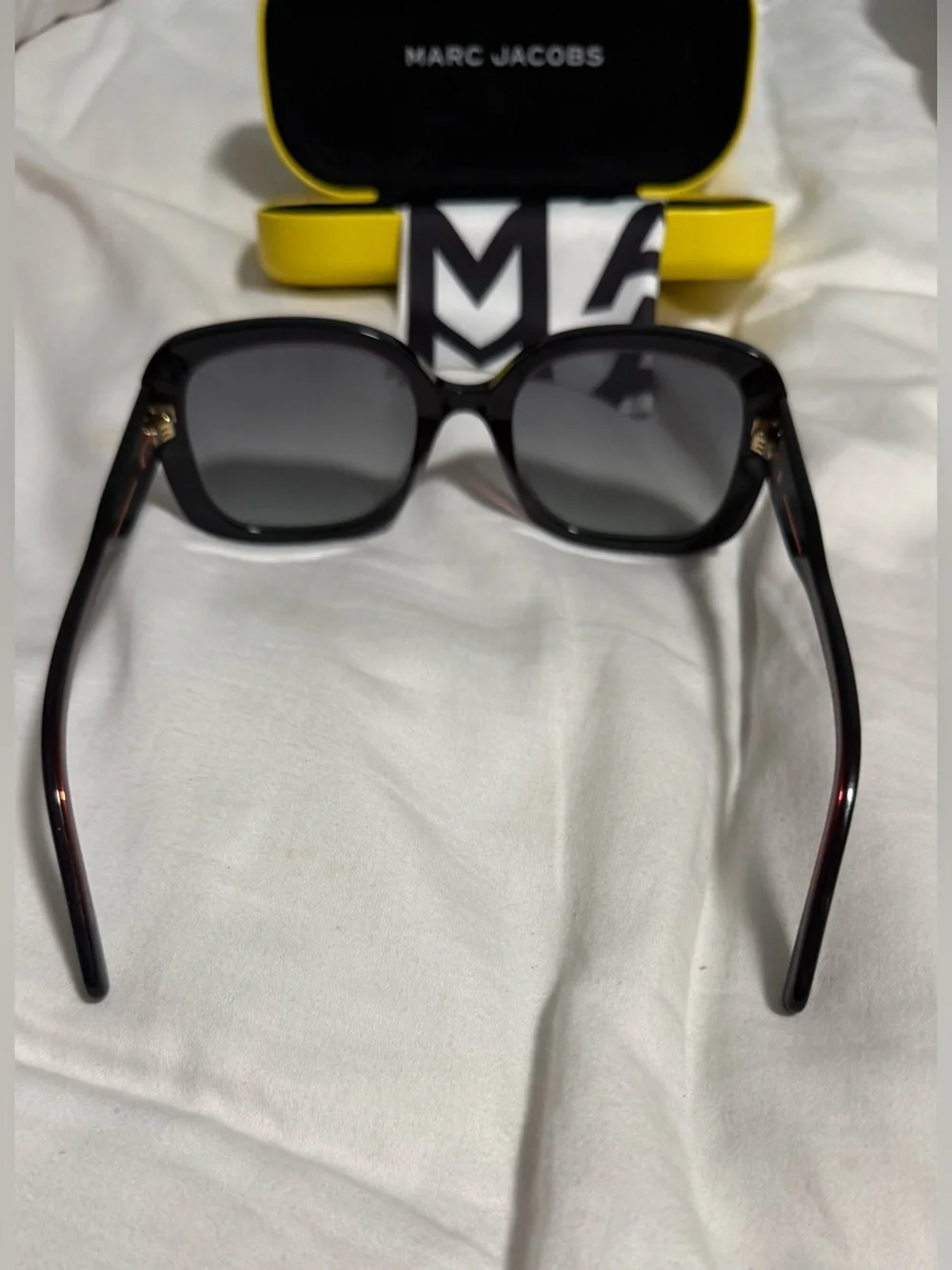 Marc Jacobs Woman’s Dark Teal Square Sunglasses with alternating pink hues! New